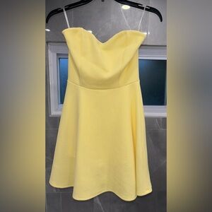 Strapless pastel yellow mini dress